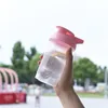 300 ml plastikowej wytrząsarki butelki z wodą Dzieci Przenośne sporty na świeżym powietrzu kubki na mleko z pokrywką wielokolorami przezroczysty kubek różowy zielony fioletowe kolory 2 85Bz