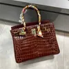 Est le sac de créateur de mode Platinum seulement 30. Le même crocodile à grain de cuir de vache portable une épaule messager décontractée 14ri féminine