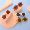 2024 Nouveau cadre rond Lunettes de soleil Couleurs de bonbons Lunettes de soleil Kids Travel Termroproping Beach Sun Sunshes