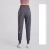 Женская йога йога брюки брюки свободные спортивные штаны Lady Fitness Sports Joggers, проводя эластичные брюки для похудения.