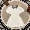 Top Girls Jirt Kids Designer Vêtements Plaid Revers Robes fille taille 100-150 cm Robe de princesse Summer à manches courtes Baby Roule 24MA