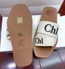 2024 Designer Sandal Man Woody Mule Flat Sandale Slide Letter Lands Slipper Womans Pantres Summer Place Place Toom Tovvas Shoe Flip Flop