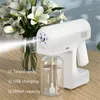 Liquid Soap Dispenser Handhållen Atomisering Sanitizer Sprayer Blå ljus Uppladdningsbar Nano Atomizer Portable Alcohol Desinfection Machine