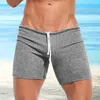 Pantaloncini da uomo uomo atletico estate cohring slim fit al di sopra del ginocchio a colori solidi vacanze sport pantaloni per homewear