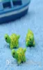 人工的なかわいい緑の亀の動物妖精の庭のミニチュアノームモステラリウム樹脂クラフト庭の装飾のための置物6422924