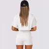 Kıvrılmış kenarları ve açık göbek Y2K Amerikan baharatlı üst f51423 ile kadın yaz çeyreği kollu yuvarlak boyun için eğlence spor tarzı tişört