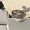Le designer Westwoods Double Layer Ring est plein de diamant Crown Saturne peut être divisé et couple en couple en direct de nombreuses vies Nail