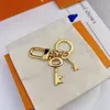 Designer Keychain Fornaset Womens Luxury Bag Charm Gold Keyring Stainless Steel Mens Fashion Key Chain Classic Key Ring with Box