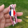 J'adore le bracelet rose Paris 2024 FRANCE FRACLE VERRE PHOTO PHOTO MAIN MAIN MAINT