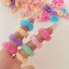 Akcesoria do włosów 100pcs/pudełko mini słodkie dziecko do włosów kolorowe dla dzieci krawat hair scrunchies elastyczne gumki dla dzieci akcesoria do włosów