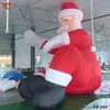 Atividades de jogos ao ar livre 26 pés de altura Inflável Big Santa 8m de altura gigante Papai Noel para decoração de Natal