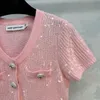Designer fransk klänning rosa paljett kort ärm stickad klänning med midjeband för kvinnokläder