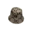 Chapeau de soleil seau chapeau décontracté unisexe de luxe capuchon de bonnet de bonnet femme cappellino réversible chapeaux pêcheur canvas ajusté lettre de bonne qualité FA120