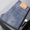 Mäns jeansdesigner 2024 Spring och Autumn New Elastic Straight Leg Pants Big Brand Long Trendy Youth Casual Iz0Z