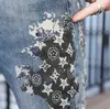 メンズジーンズデザイナーヨーロッパファッションブランド夏のために印刷されたスリムフィットスモールフィート