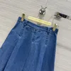 Retro originele blauwe zachte denim laag taille geplooide middelste lengte rok