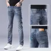 Mäns jeansdesigner 2024 Spring och Autumn New Elastic Straight Leg Pants Big Brand Long Trendy Youth Casual Iz0Z