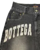 Calça feminina bordado de tendência vintage bordado de jeans de jeans de jeans punk joelho casual para homens e mulheres streetwear