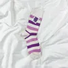 Meias masculinas 23SS Coréia do sul Dongdaemun Squesty Socks Childrens Mid Tube Primavera/verão Sorrindo rótulo de rótulo bezerro de meias longas Instagram da moda