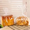 Enveloppe-cadeau 100pcs sacs de collations en plastique transparent pain pain à pain à pain à biscuit avec twist fête faveur transparent