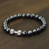 Bracelets de charme notant nouveau bracelet pour hommes minimalistes authentique en pierre d'hématite naturelle Braslet Black Zria Crown Lion Braclet Accessoires Y240510