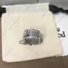 La versione High del marchio Westwoods trasuda un senso di lusso con fibbie per cinture piene di diamanti, lettere e anelli per coppie Nail