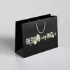 Geschenkverpackung 500pcs/Lot Großhandel Custom Logo wiederverwendbare Papierverpackungen Einkaufstaschen Weihnachtsbeutel mit Griff
