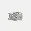 La versione High del marchio Westwoods trasuda un senso di lusso con fibbie per cinture piene di diamanti, lettere e anelli per coppie Nail