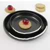 Assiettes Black and White Ceramic Plate Creative Special Special Gap Dissert Molecular Cooking Table Vole du disque irrégulier