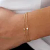 Vriua utsökta kvinnors guldarmband 14k guldpläterade skiktade armband Enkelt mousserande vridkedja armband justerbart diamantarmband set kvinnor guldsmycken