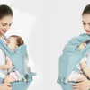 Transportörer slingrar ryggsäckar 0-36 månader Ergonomisk barnbärare Spädbarn Baby Hipseat Carrier Front Facing Ergonomic Kangaroo Baby Wrap Sling Travel Y240514