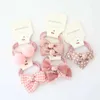 Accessoires de cheveux 10pcs / lot filles Sweet Girls Band Flower Bow Ball Small Ball Scrunchies Kids Elastic Hair Ties Bands élastiques accessoires de cheveux pour bébé