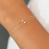 Vriua utsökta kvinnors guldarmband 14k guldpläterade skiktade armband Enkelt mousserande vridkedja armband justerbart diamantarmband set kvinnor guldsmycken