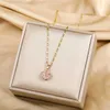 Colliers de pendentif Nouveaux colliers en acier inoxydable pendant rose romantique rose romantique