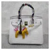 Macaron Platinum Bag Designer 2024 Serie Frauen Handheld Crocodile Cow Leder Frauen Mode ein Schulter Frauen 8fa5