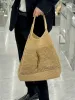 Bolsa de grife feminino bolsa de luxo Raffias Bolsas de palha empolgadas à mão 2024 Totes de bolsas de ombro de compras