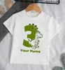 T-shirts Personaled Dinosaur Birthday Kids T-shirt Top Party Outfit Dino Birthday Party Boy Tshirt kläder med namn och ålder T240513