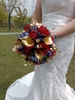 Red roses, purple roses, golden calla lily combination wedding bouquet