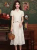 Arbetsklänningar kvinnors kinesiska kortärmade ihåliga broderade blazer kjol set vintage flip krage panna spänne kostym halv två bit