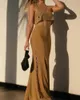 ワークドレス女性ファッションゴールデンスリックニットフィッシュテールスカートセットセクシーなホローアウトクロップドタンクトップスーツ2024サマーレディー職業ビーチ