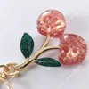 Cute Cherry Keychain Bag Charm Decoration Accessory Red Pink Crystal Cherry Pendant Decor gold Green Leaf High Quality Women Men Luxury Designer Apple Key Chain Gift