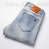 Heren jeans ontwerper lente/zomer dunne high -end Europees slanke fit kleine voeten trendy merk lichtblauwe broek nj41