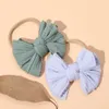 Accessoires de cheveux nouvelles couleurs de solid comes de bébé élastiques arc moulé de nouveau-nés pour bébé pour bébés enfants