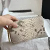 Designer tas schoudertassen Baguette luxe Zuid -Afrika Python portemonnee heren en dames casual slangenhuid koppeling modetrend single hold grijper tas portemonnee