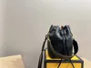 Högkvalitativ mini hinkväska topp lyxdesigner crossbody axelväskor handväska kvinnors mode läder handväskor handväska grossist borttagbara axlar rem 2024