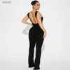 Kobiety Jumpsuits Rompers Cutenova Summer Solid Kolor Niepowtarzalny Squevele Deckline Seksowy sportowy kombinezon Backless Puste Kołnień Suit Street Suit WX