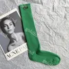 Frauen lässige Socken Lange Socken Hosiery Desgienr atmungsable Sportsock Brandbrief Stricksocke