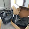 New Designer Rodeo Handbag Women Soft Leather Shoulder Crossbody Bag Women Used Effect With One Charm In Black Tote Luxury Classic Female Briefcase 240514