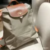 Luxury Leather Designer Brand Kvinnspåse Double Shoulder Nylon Waterproof Folding Backpackg01V