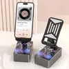 Decorative Figurines Creative Bluetooth Mobile Phone Holder Audio Power Bank Three-in-one Multi-function Foldable Rotating Desktop